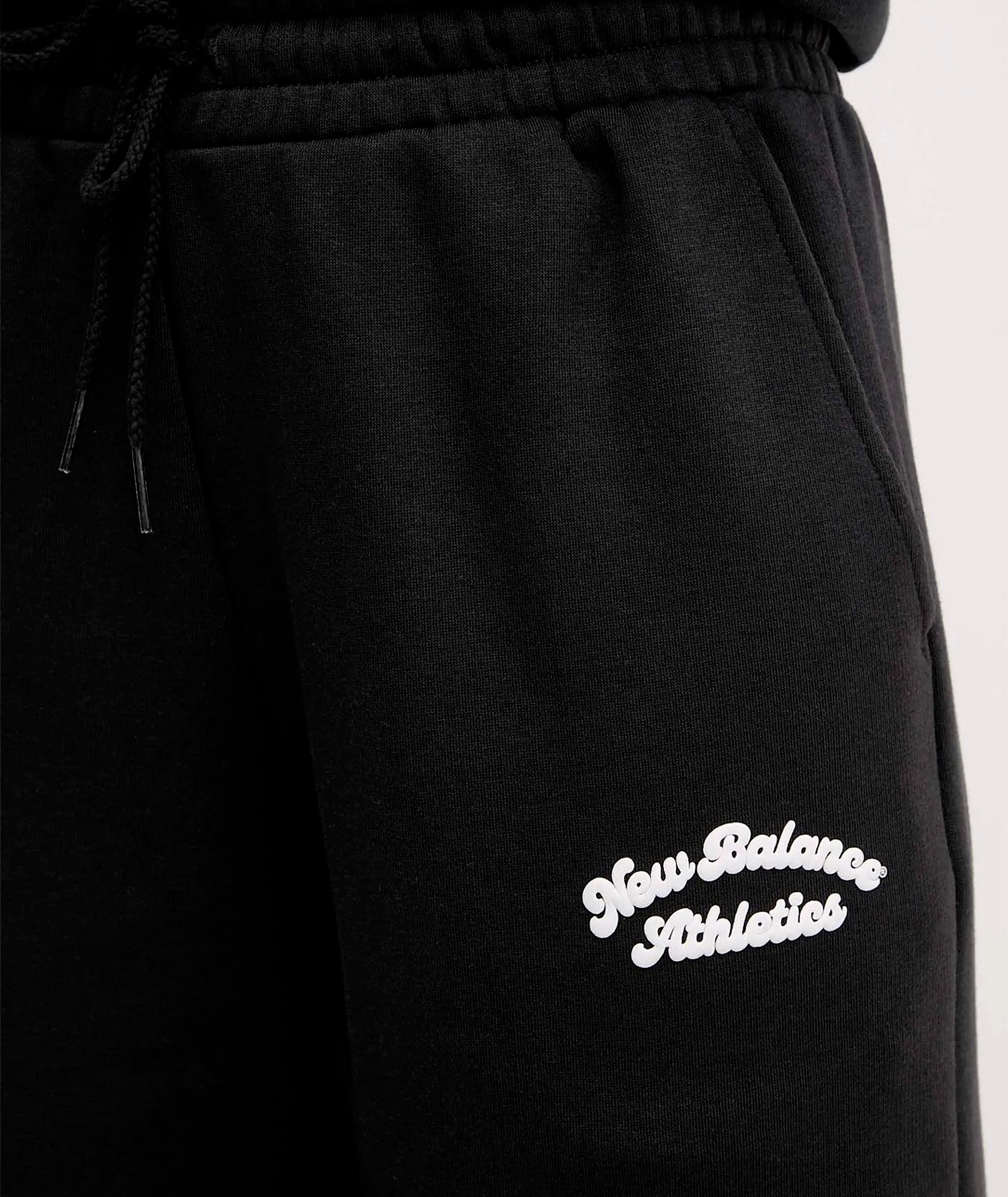 LINEAR HERITAGE WIDE LEG - PANTALONE WP53902BK . NEW BALANCE 